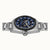 Herrenarmbanduhr im Seitenprofil mit blauem Skelettzifferblatt und Metallarmband