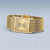 Damenuhr mit breitem goldfarbenem Milanaise-Armband, rechteckigem Gehäuse und Steinbesatz