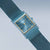 Bering Damenuhr im Diagonalblick: blaues Mesh-Armband, blaues Zifferblatt mit goldfarbener Lünette