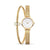 Bering Classic Damenuhr mit goldfarbenem Mesh-Armband und weißem Zifferblatt