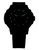 Zifferblatt-Detail einer Herrenuhr mit grün-gelb leuchtenden Stundenmarkern