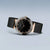 Damenuhr mit rundem schwarzem Zifferblatt und schwarzem Milanaise-Armband, roségoldene Akzente