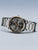 Bering Herrenarmbanduhr in Edelstahl mit schwarzem Zifferblatt und orangefarbenen Markierungen
