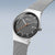 Bering Herrenuhr mit dunklem grauem Zifferblatt und Milanaise-Armband, Krone seitlich