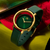 Damenuhr mit grünem Zifferblatt, goldfarbenem Gehäuse und grünem Lederarmband