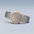Damenuhr am Handgelenk mit dunklem Zifferblatt, Roségoldgehäuse und Milanaise-Armband