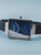 Damen-Armbanduhr mit blauem Zifferblatt, Milanaise-Stahlband und sichtbarer Krone