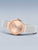 Damenuhr mit Roségold-Lünette, beigem Zifferblatt und Milanaise-Armband.