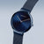 Unisex-Armbanduhr seitlich: rundes blaues Zifferblatt, blaues Milanese-Armband