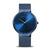 Herrenuhr mit blauem Milanaiseband, rundem Gehäuse und blauem Zifferblatt mit Indexen.
