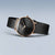 Damenuhr mit schwarzem Zifferblatt, breitem schwarzem Milanaise-Armband und Roségold