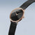 Damenuhr mit schwarzem Zifferblatt, Roségoldlünette und schwarzem Milanaise-Armband