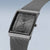 Bering Herrenuhr mit grauem Milanaise-Armband, viereckiges Gehäuse und dunkelgraues Zifferblatt