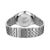 Herrarmbandsur bakifrån, silverfärgat metallarmband med spänne och graverad bottenplatta