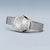 Damen-Armbanduhr mit hellem Zifferblatt und silberfarbenem Metall-Milanaise-Armband