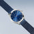 Bering Damenuhr mit rundem Gehäuse, blauem Zifferblatt und blauem Mesh-Armband