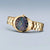 Bering Solar Damenuhr mit goldfarbenem Edelstahlarmband, rundes Gehäuse, blaues Zifferblatt