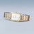 Bicolor Damenuhr mit weißem Zifferblatt, rechteckigem Goldrahmen und Metallgliederarmband