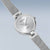 Bering Damenuhr, rundes silbernes Zifferblatt mit Indexen und Milanaise-Armband
