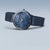 Bering Damenuhr Vorderansicht mit blauem Zifferblatt und dunkelblauem Milanaise-Armband