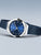 Damenarmbanduhr Bering mit blauem Zifferblatt und silbernem Gehäuse am Milanaise-Armband