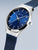 Damenarmbanduhr Bering mit Krone, blauem Zifferblatt und blauem Milanaise-Armband
