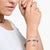 "Armband med blå pärlor och fiskhänge i 925 sterlingsilver"