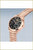 "Damklocka med roséguldpläterat metallarmband och rund svart urtavla"