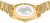 Baksida med graverat världskarta på ett gyllene metallarmband