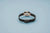 Damenarmbanduhr Bering mit schwarzem Armband und Schließe, Rückseite