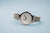 Bering Damenuhr mit silbernem Zifferblatt und Milanaise-Armband im Profil