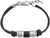 Läderarmband med svarta pärlskivor och metallelement, kedjelås