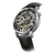 Herrenuhr in Silber mit schwarzem Lederarmband, seitlicher Blick aufs sichtbare Uhrwerk
