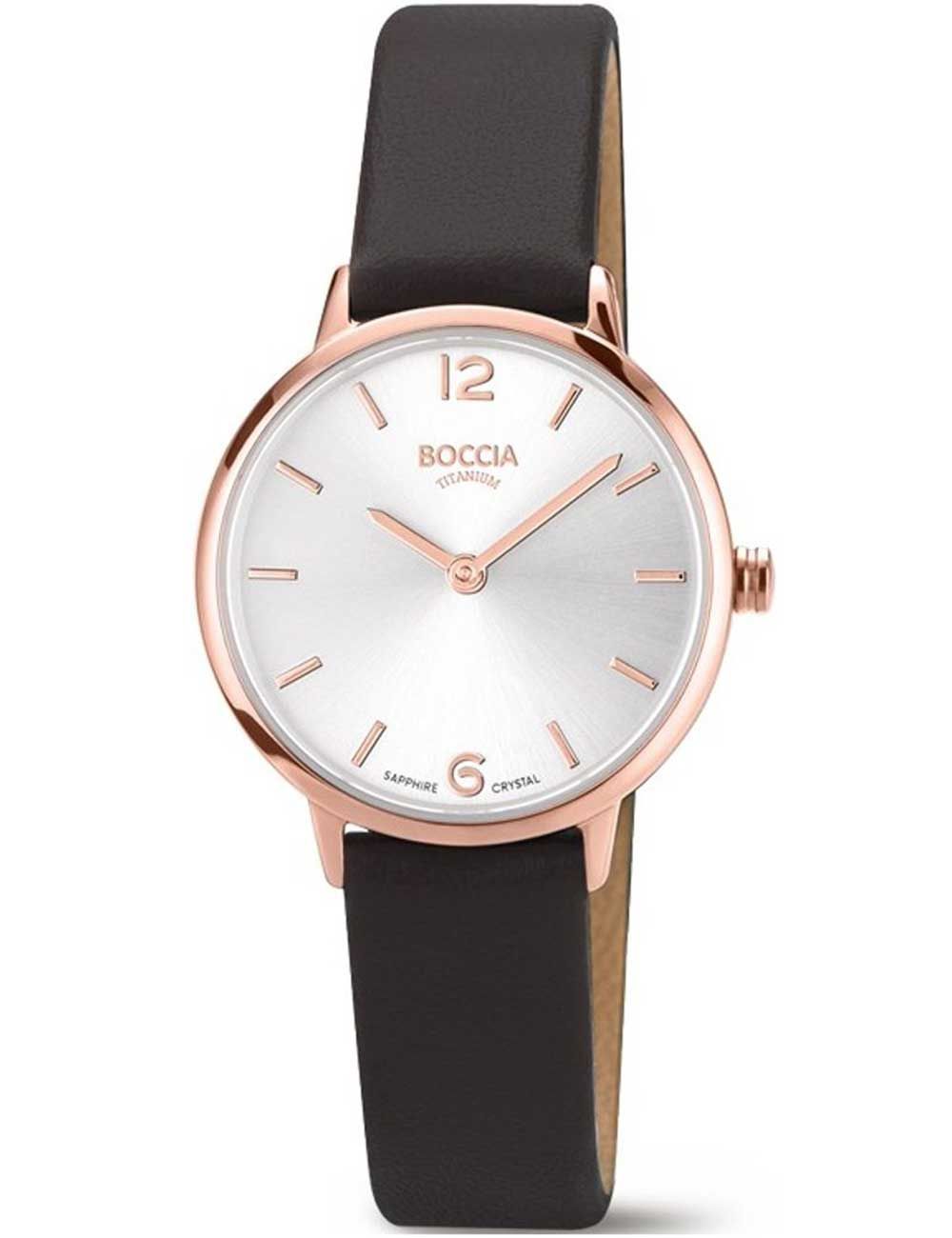 Damenuhr mit roségoldener Titanlünette, weißem Zifferblatt und schwarzem Lederarmband.