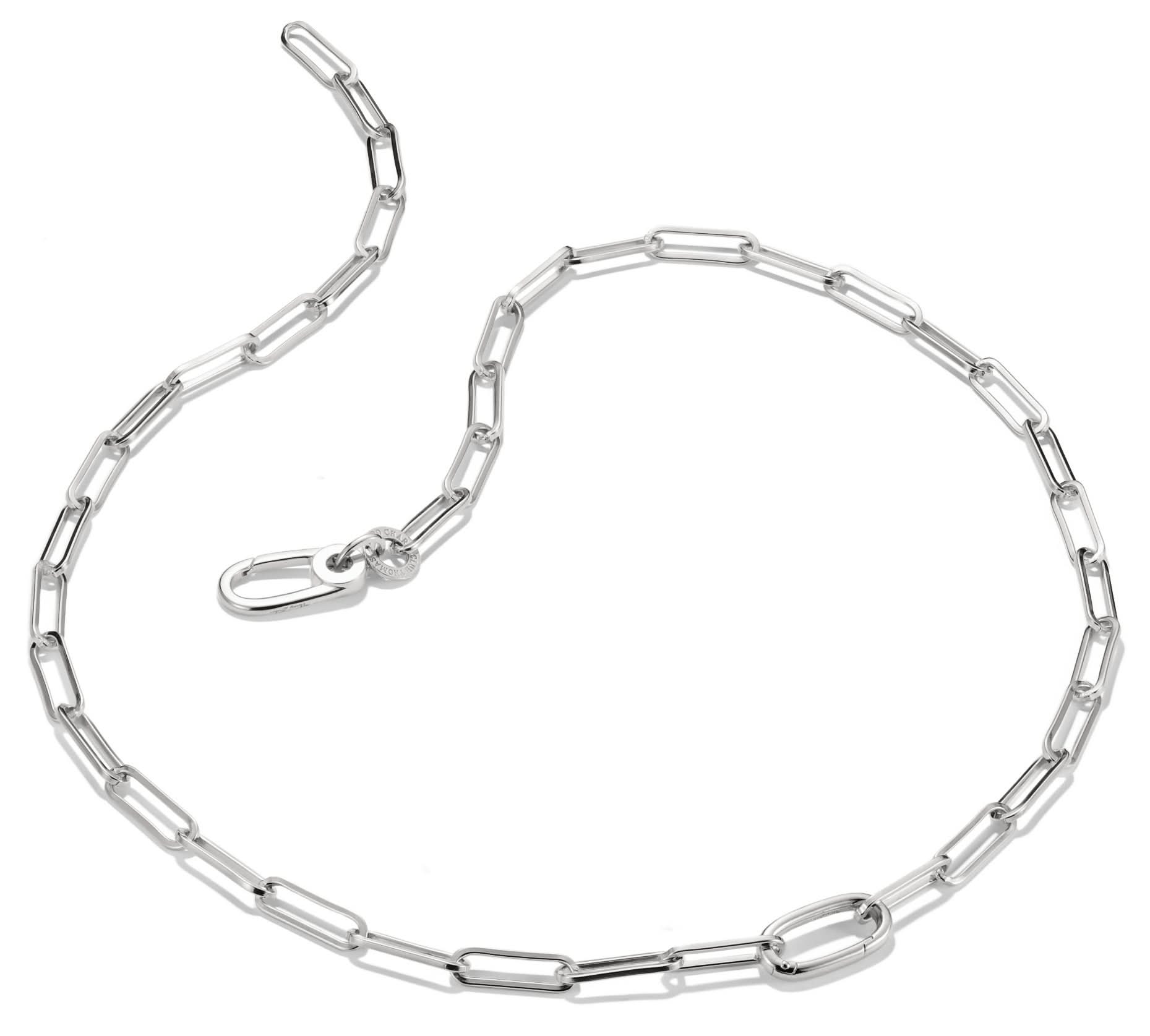 Silversmycke med kedja och paperclip-länkar samt oval länk