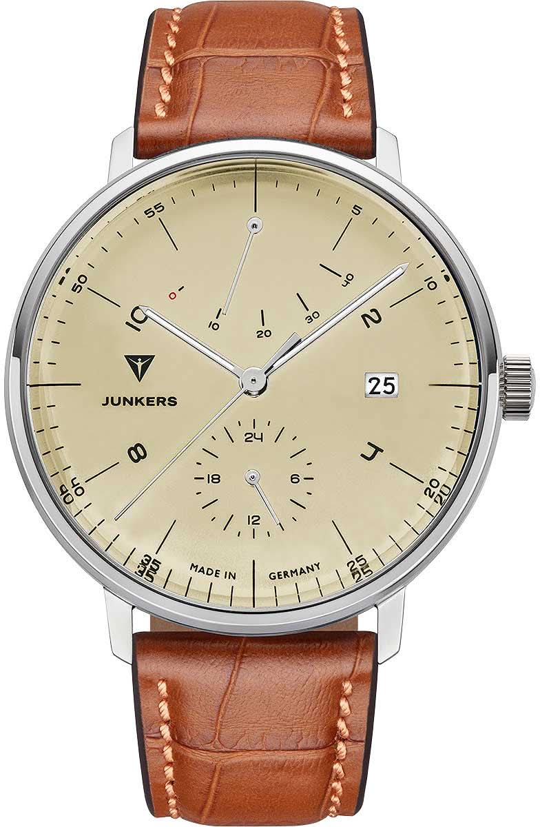 Junkers herrur med brunt läderarmband, runt silverfärgat boett och beige urtavla.