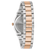 Bulova Damenuhr Bicolor, Seitenansicht mit Edelstahl-Gliederband und Roségoldstreifen