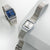 Zwei Casio Vintage Armbanduhren auf hellen Flächen mit silbernem Mesh-Armband