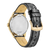 Herrklocka med guldfärgat hölje och svart läderarmband, baksida