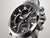Casio Edifice herrklocka med svart urtavla, silverfärgat boett och röda detaljer