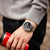 Casio Edifice herrklocka på handleden med silverfärgat metallarmband och svart urtavla