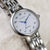 Citizen Eco-Drive Damenarmbanduhr Detail mit blauem Sekundenzeiger und Zifferblatt