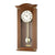 N Wall clock in walnut color with pendulum movement and round dial, Westminster chime