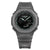 G-Shock Armbanduhr von vorn: graues Band, schwarzes Zifferblatt, grüne Indizes und Display