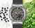 Damen-G-Shock-Armbanduhr mit grauem Zifferblatt, silberner Metalllünette und schwarzem Band