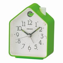 Seiko Wecker mit grünem Gehäuse und analogem Ziffernblatt, arabischen Ziffern und Zeigern