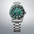 Seiko herrarmbandsur med grön urtavla, stållanse och metallarmband