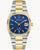 Bulova Herrenarmbanduhr mit zweifarbigem Metallband, blauem Zifferblatt, Stabindizes und Datum