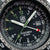Närbild på Luminox RECON-klocka för herrar: svart urtavla med självlysande gröna index