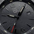 Luminox urtavla detaljer: logotyp, index och "200 METERS" gravyr; svart yta.